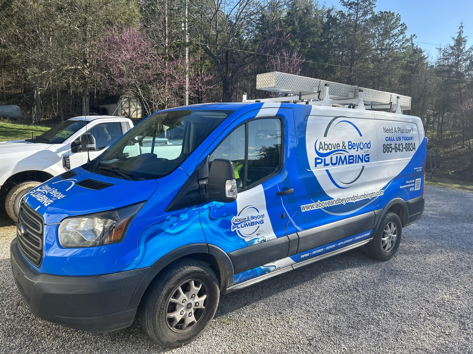 Above and Beyond Plumbing branded service van parked in Maryville, TN